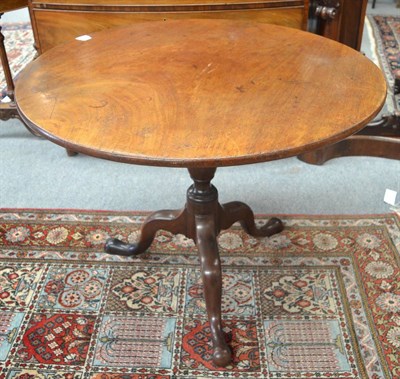 Lot 1306 - George III mahogany flip-top tripod table