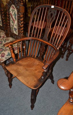 Lot 1314 - A 19th century yew wood and elm Windsor armchair