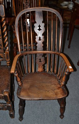 Lot 1319 - A 19th century ash and elm Windsor high-back armchair