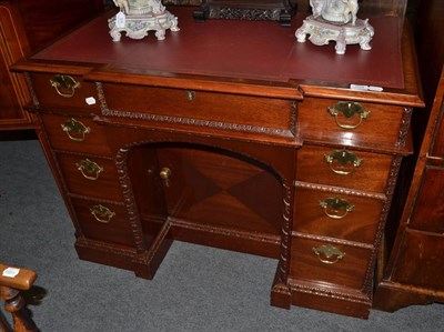 Lot 1328 - A reproduction mahogany desk in the Georgian style with leather top and oak lined drawers, No 1...