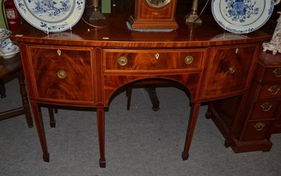 Lot 1329 - George III mahogany and satinwood banded bow fronted sideboard