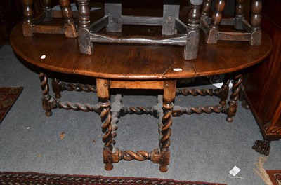 Lot 1358 - An early 18th century English double gate leg table on spiral turned legs