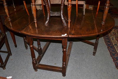 Lot 1363 - An 18th century oak gateleg table