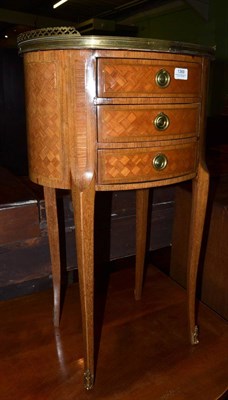 Lot 1369 - A Louis XV style parquetry and gilt metal three drawer bedside chest