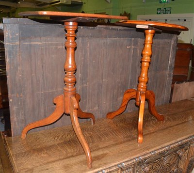 Lot 1384 - A Georgian mahogany tripod table with rectangular top and a reproduction tripod table with circular