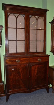 Lot 1400 - Glazed mahogany bookcase cupboard