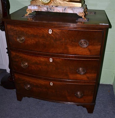 Lot 1407 - George III mahogany bow fronted chest