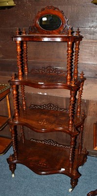 Lot 1418 - Victorian figured walnut four tier whatnot