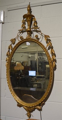 Lot 1454 - An 18th century style gilt oval pier glass