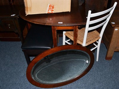 Lot 1462 - A small drop-leaf table, small oak stool, water feature, rush-seated chair, oval mirror and a music