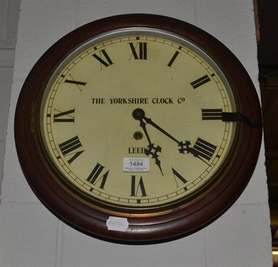 Lot 1484 - * A late 19th century circular mahogany wall clock labelled 'The Yorkshire Clock Company,...