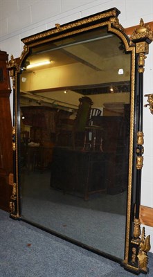 Lot 1487 - Victorian gilt and ebonized overmantel mirror