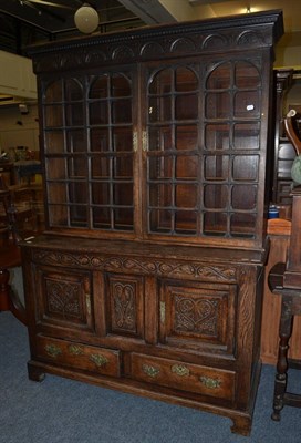 Lot 1490 - * George III joined oak chest with cupboard doors and two drawers below, 134cm wide, and an...