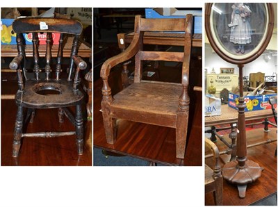 Lot 1494 - A Victorian mahogany poll screen with later panel, a child's ibex commode chair and a child's...