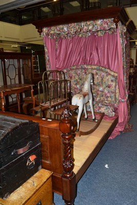 Lot 1529 - A Victorian half tester bed with plain moulded canopy and panelled footboard with turned supports