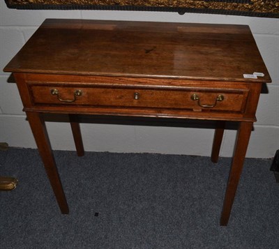 Lot 1535 - An 18th century oak and mahogany cross banded side table