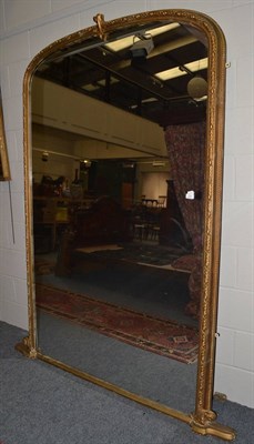 Lot 1537 - Victorian gilt overmantel mirror, 202cm high