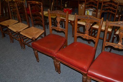 Lot 1549 - * An 18th century country dining chair, three ladder back rush seated chairs, set of four late...