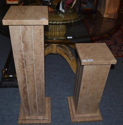 Lot 1554 - Two travertine pedestals of graduated form