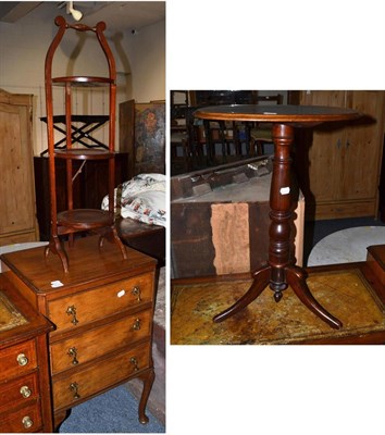 Lot 1559 - Inlaid three tier cake stand, walnut three height chest and a mahogany oval top tripod table