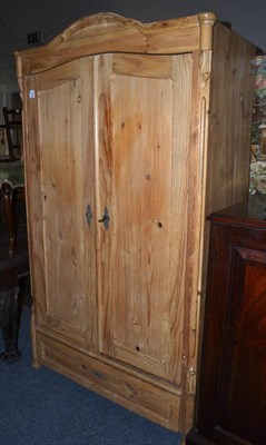 Lot 1567 - A 19th century pine wardrobe