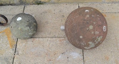 Lot 1584 - Two stone finials in the form of spheres