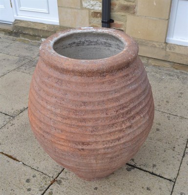 Lot 1589 - A 19th century terracotta olive jar