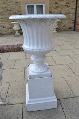 Lot 1590 - Victorian campana shaped cast garden urn and base