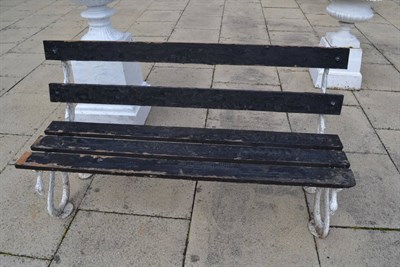 Lot 1592 - Victorian cast iron garden bench with serpentine snake-end supports and wooden slatted seat