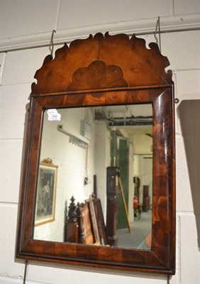 Lot 1598 - Oyster veneered cushion framed mirror