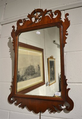 Lot 1604 - A George III style fretwork mirror