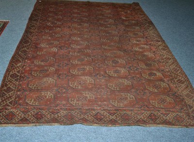 Lot 1622 - A 19th century Kizin Ayak Turkman carpet, Emirate of Bukhara, the madder field of Tank Naska...