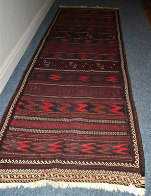 Lot 1631 - Balouch Kilim, West Afghanistan, the field with wide and narrow bands of chevrons and geometric...