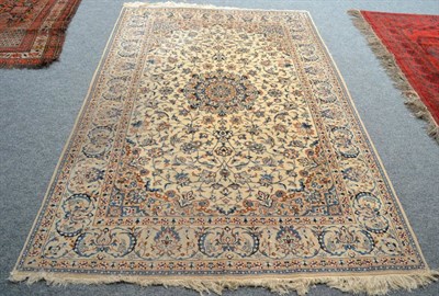 Lot 1632 - Nain rug, Central Persia, the ivory field of palmettes and scrolling vines centred by a...