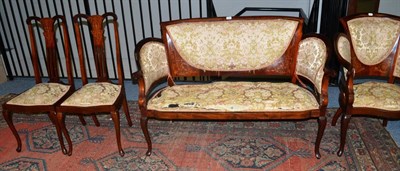 Lot 1641 - Late Victorian mahogany and floral marquetry salon Suite comprising two seater settee, four upright