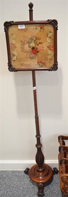 Lot 1658 - A Victorian mahogany pole screen