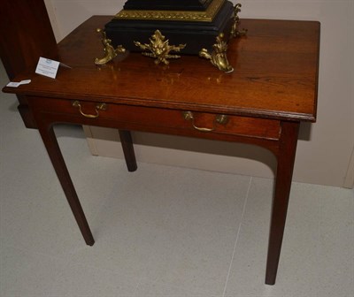 Lot 1670 - An 18th century oak side table on chamfered legs