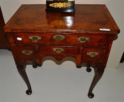 Lot 1679 - An 18th century walnut dressing table on later cabriole legs