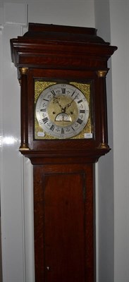 Lot 1689 - An oak eight day longcase clock, caddied pediment, 11-inch dial with chapter ring bearing later...