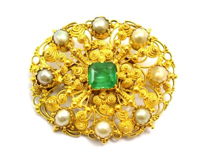 Lot 3 - # An emerald and split pearl brooch, the oval form with cannetille decoration, measures 3.3cm...