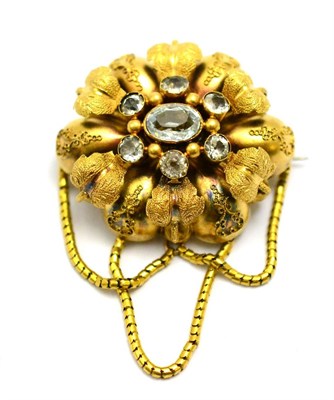 Lot 6 - # A Victorian brooch of floral form, set with aquamarines with swag suspensions, measures 4cm...
