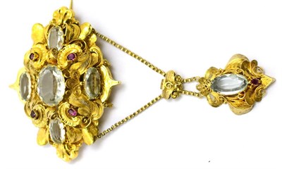 Lot 17 - # A Victorian brooch set with aquamarines and rubies with a drop pendant and swag chains,...