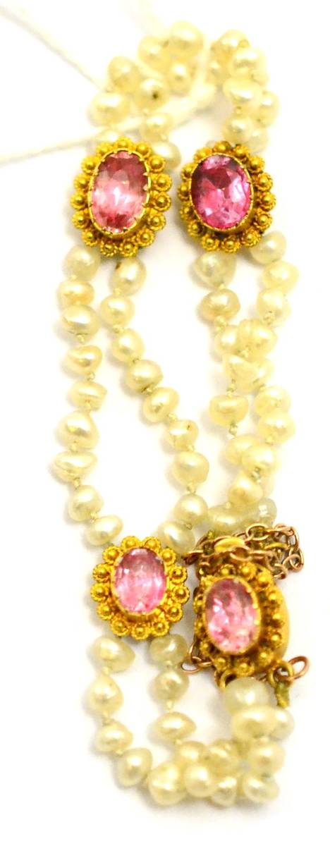 Lot 21 - # A pearl and pink stone bracelet, four foil backed oval cut pink stones in cannetille...
