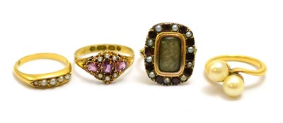Lot 22 - # A 15ct gold garnet and seed pearl cluster ring, finger size P, a split pearl five stone ring,...