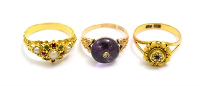 Lot 35 - # A split pearl, ruby and emerald ring, finger size N, a 9ct gold amethyst and diamond ring, finger