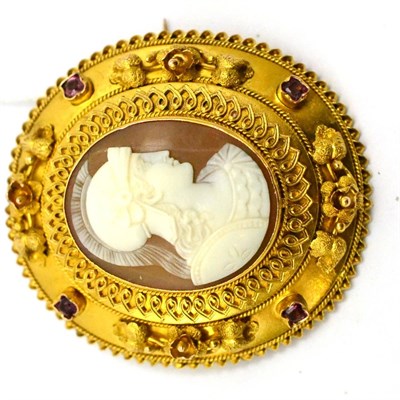 Lot 48 - # A 19th century cameo brooch, the oval shell cameo carved with a centurion, within an...