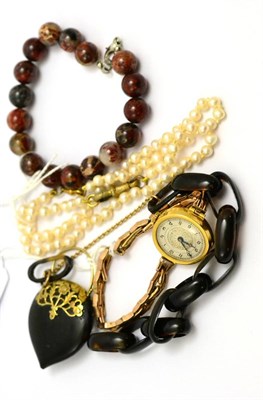 Lot 61 - # An agate bracelet, a tortoiseshell bracelet, a lady's wristwatch and two cultured pearl bracelets
