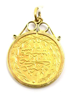 Lot 72 - # An Arabic coin, loose mounted as a pendant