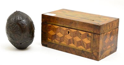 Lot 98 - A 19th century coconut shell depicting armorial panels and an inlaid tea caddy (2)