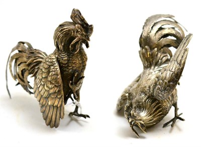 Lot 113 - A pair of German .800 silver table ornaments modelled as fighting cocks
